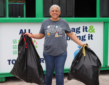 A member of the 10 to 90 team recycling